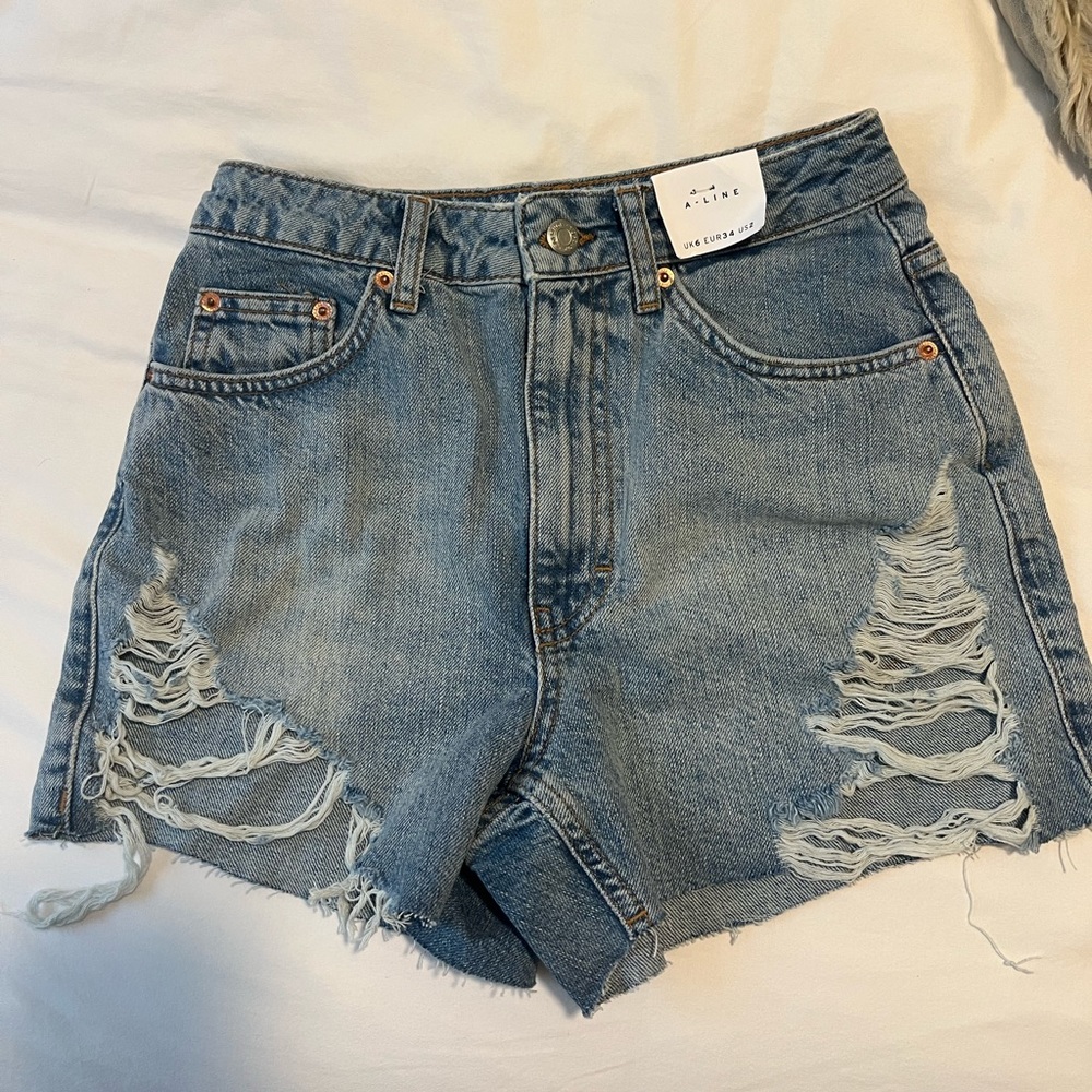 Top shop ripped a line mom shorts